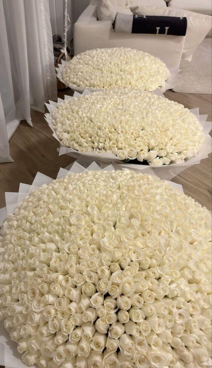 Corporate meeting room with carefully timed floral arrangements that maintain elegance throughout business hours